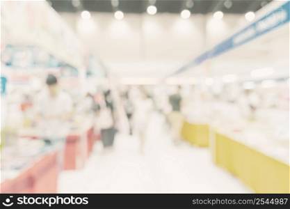 Abstract blur background crowd people in shopping mall for background, Vintage toned.