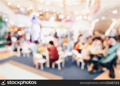 Abstract blur background crowd people in shopping mall for background, Vintage toned
