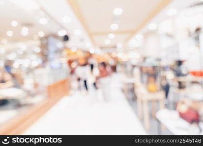 Abstract blur background crowd people in shopping mall for background, Vintage toned.