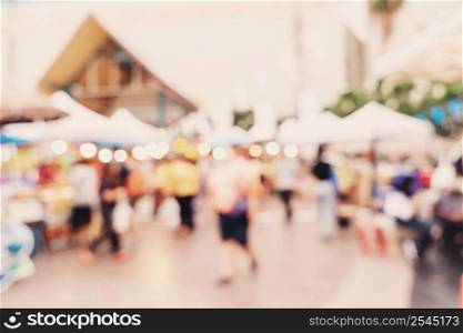 Abstract blur background crowd people in shopping mall for background, Vintage toned.