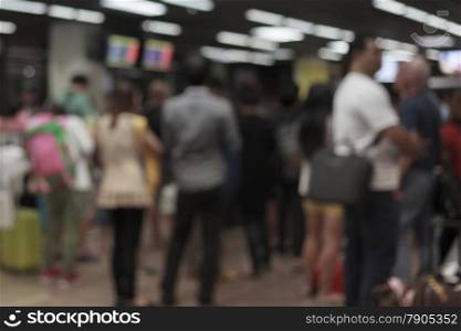 Abstract blur background of business crowd or people waiting queue for transportation or taxi at meeting point, shallow depth of focus