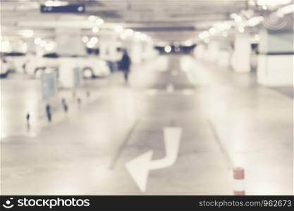 Abstract blur car parking in shopping mall for background