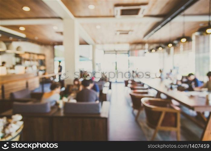 Abstract blur coffee shop interior background - vintage filter