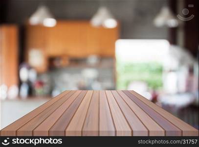 Abstract blur coffee shop with empty wooden top. For product display