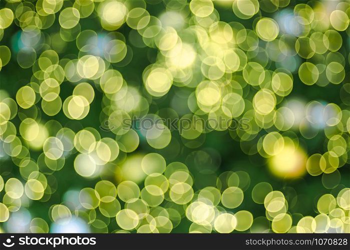 Abstract blur decoration ball and light string on christmas tree with bokeh light background.winter holiday seasonal