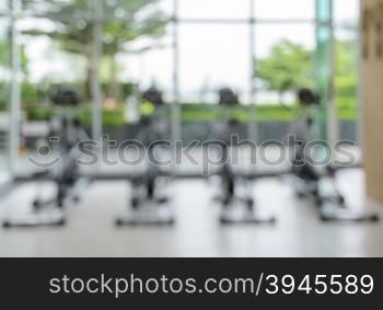 Abstract blur fitness and gym room interior background. Image for health concept
