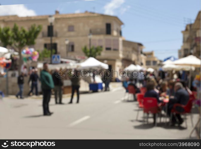 Abstract blur image of day market on street for background usage.