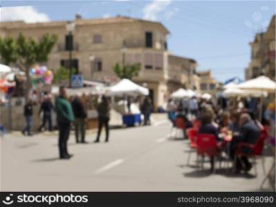 Abstract blur image of day market on street for background usage.