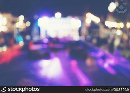 Abstract blur image of night festival on street background with bokeh.