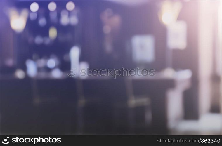 Abstract blur image of Pub interior of bar counter with stool chairs