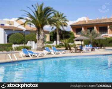 Abstract blur outdoor swimming pool landscape in hotel pool resort for background