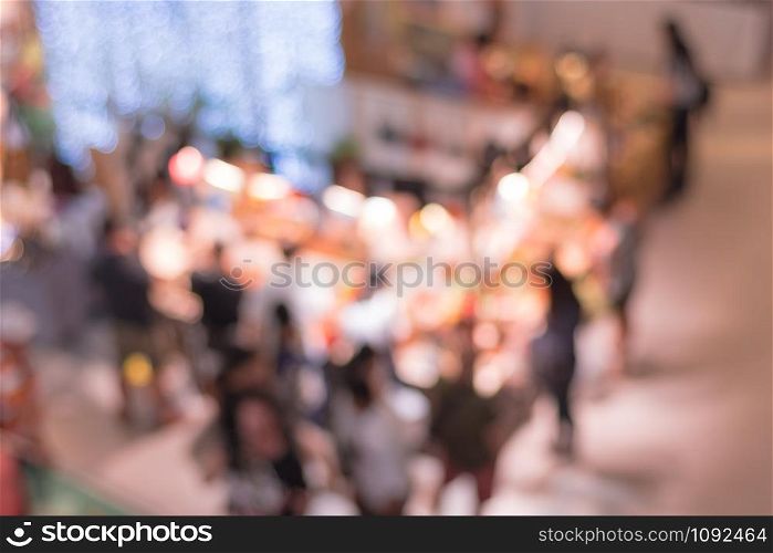 Abstract blur people shopping at gift shop in department store for background.