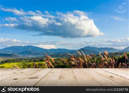 abstract blurred and wood table, beautiful mountains landscape in thailand.