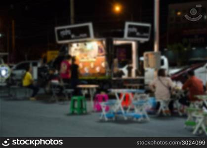 Abstract blurred background image Food Truck. Vintage tone
