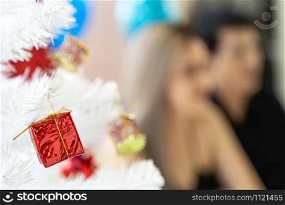Abstract blurred background of couple celebrating New Year festival holiday in living room of big modern apartment
