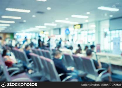 Abstract blurred background of Passengers waiting at airport boarding area