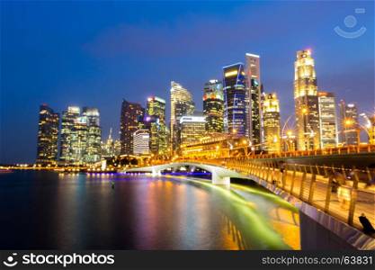 Abstract blurred background of Singapore downtown cityscape with modern skyline and city skyscraper sunset at Marina Bay