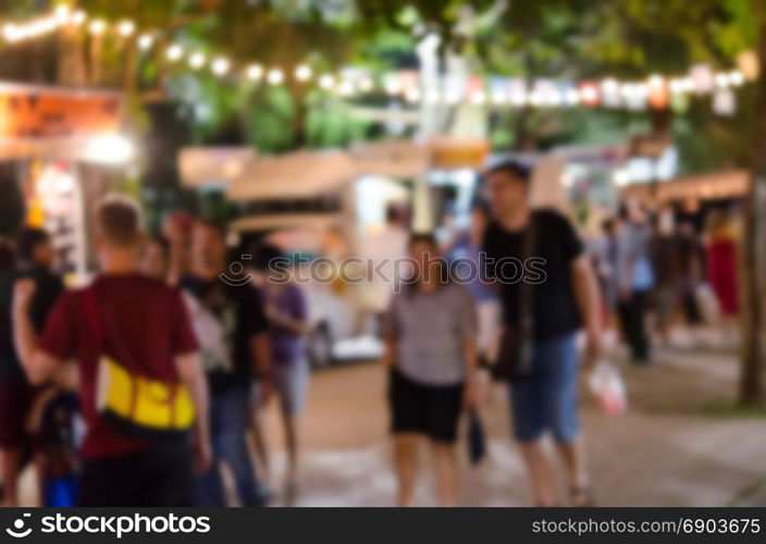 Abstract blurred food truck festival - vintage tone ,as background.