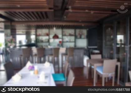 Abstract blurred hotel restaurant interior for background.