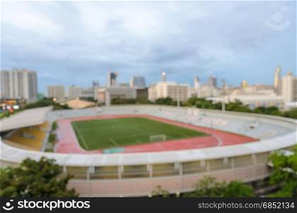 Abstract blurred image of football stadium aerial view for background