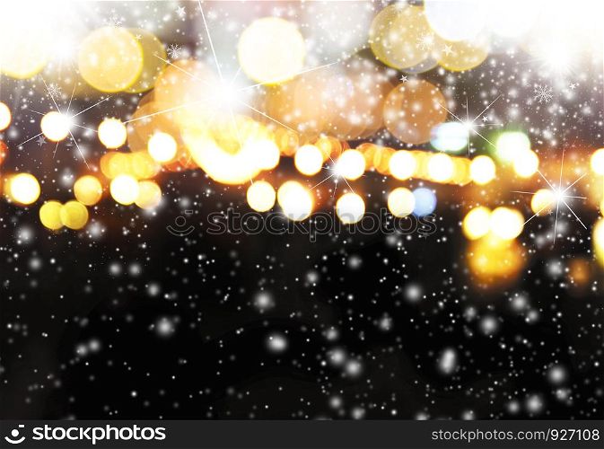 Abstract blurred light bokeh with snow christmas background