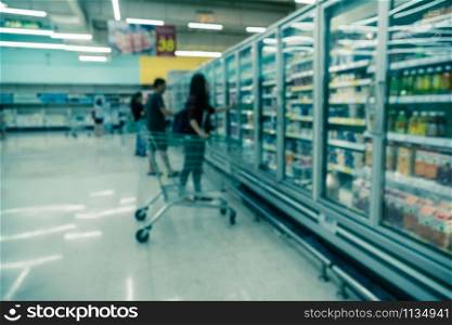 Abstract blurred photo of store in department store bokeh background, business supermarket and shopping blurred and background concept