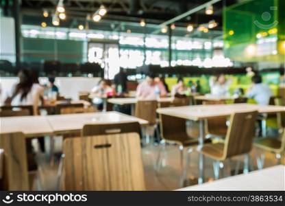 Abstract blurred restaurant or food center with light bokeh background
