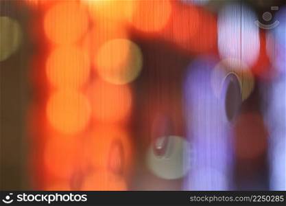 Abstract blurry bokeh on glass background