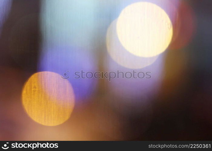 Abstract blurry bokeh reflected on glass background