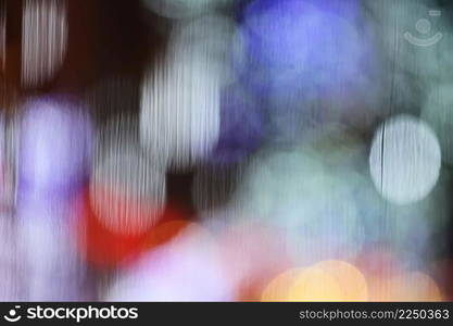 Abstract blurry bokeh reflected on glass background