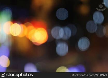 Abstract blurry bokeh reflected on glass background 