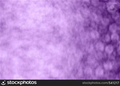 Abstract bokeh background in shades of violet colors, toned