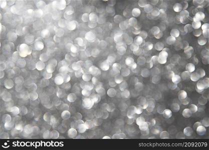 abstract bokeh background with silver lights