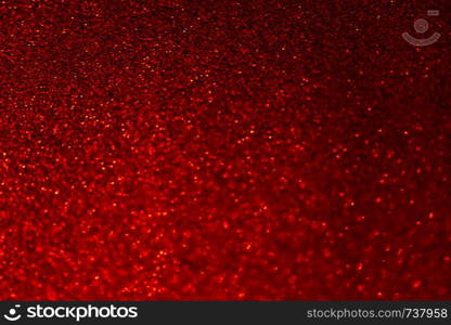 Abstract bokeh glitter background. Defocused background. Blurred bright light on black for overlay texture