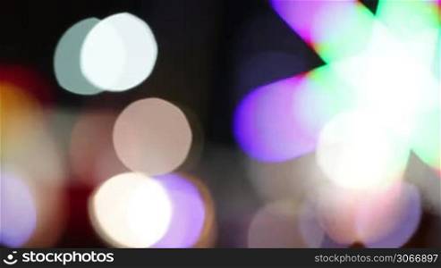 Abstract bokeh lights. Attraction park.
