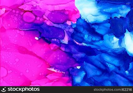 Abstract bright pink with textured blue.Colorful background hand drawn with bright inks and watercolor paints. Color splashes and splatters create uneven artistic modern design.