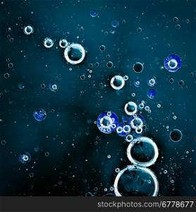 Abstract bubbles, image like a deep space and planets, blue colours