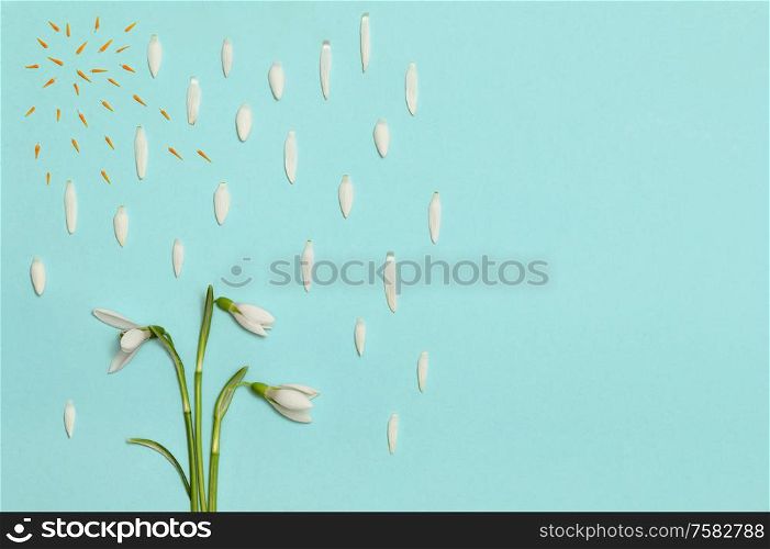 Abstract Bunch of Snowdrops and Rain on Blue Paper