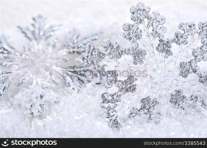 Abstract Christmas background with snowflakes. Shallow depth of field, blue tinted