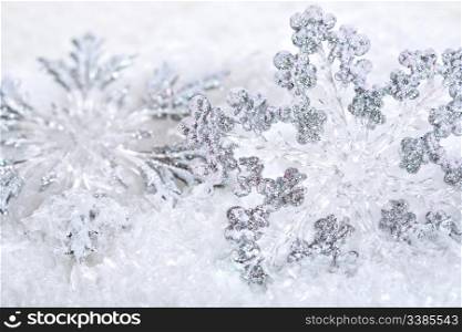 Abstract Christmas background with snowflakes. Shallow depth of field, blue tinted