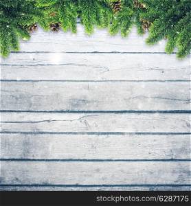 Abstract christmas backgrounds with xmas decorations over old wooden desk