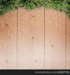 Abstract christmas backgrounds with xmas decorations over old wooden desk
