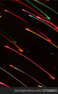 Abstract Christmas light blurred by motion