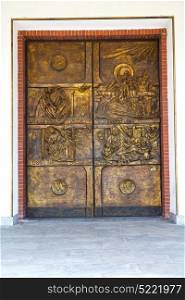 abstract church door in italy lombardy column the milano old closed brick