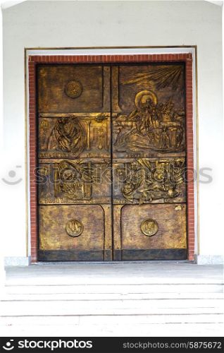 abstract church door in italy lombardy column the milano old closed brick