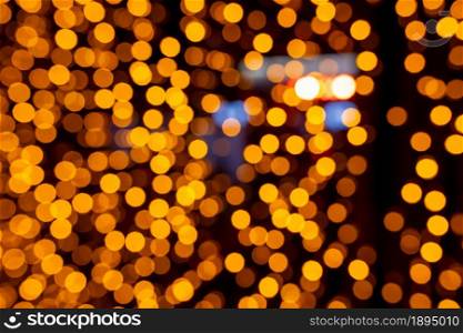 Abstract circular bokeh background of Christmaslight. bokeh from garlands. background for screensaver. Defocused lights. Blurred bokeh with yellow color lights. Abstract circular bokeh background of Christmaslight. bokeh from garlands. background for screensaver. Defocused lights. Blurred bokeh with yellow color lights.