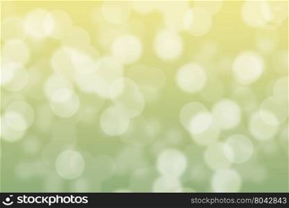 Abstract circular green and soft yellow light bokeh background