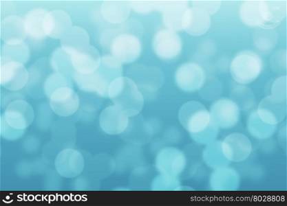 Abstract circular light blue turquoise light bokeh background