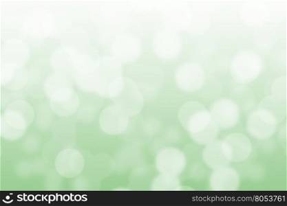 Abstract circular light green and white bokeh background