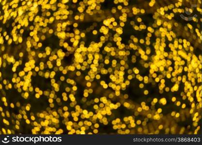 Abstract circular natural light gold bokeh background